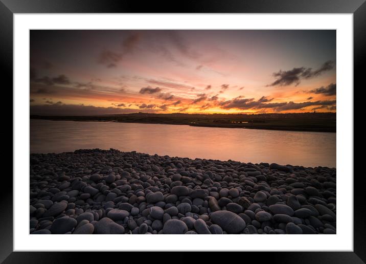 Sunrise on the Pebbles Framed Mounted Print by Tony Twyman
