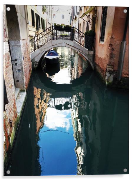 Venice, Italy : One of the small bridge on canal with reflection of building . View of bridge of sights with gondoliers boats docked under the bridge Acrylic by Arpan Bhatia