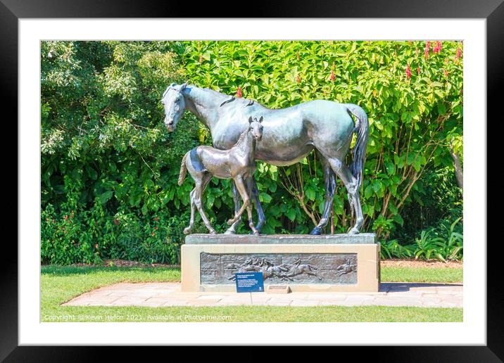 Mare and foal statue. Framed Mounted Print by Kevin Hellon