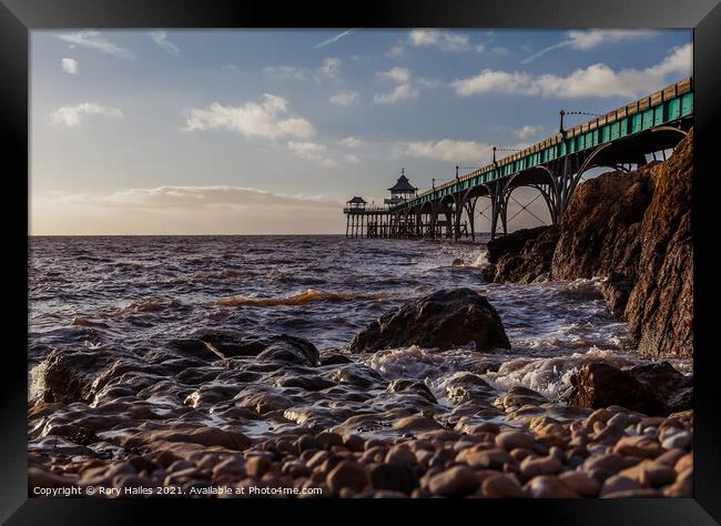 Clevedon Pier Rocks Framed Print by Rory Hailes