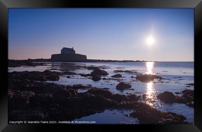 Cwyfan sunset. The chapel in the sea, off Anglesey, Wales. Framed Print by Jeanette Teare