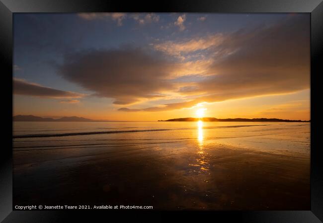 Sunset at Llanddyn from Newborough beach Framed Print by Jeanette Teare