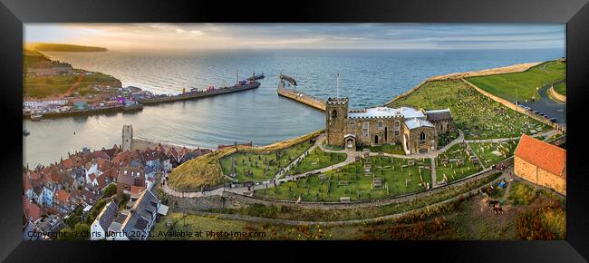 Saint Marys church and Whitby harbour at sunset. Framed Print by Chris North