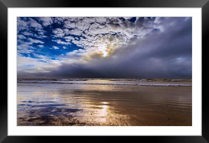 Breaking through the stormclouds Framed Mounted Print by Stuart C Clarke