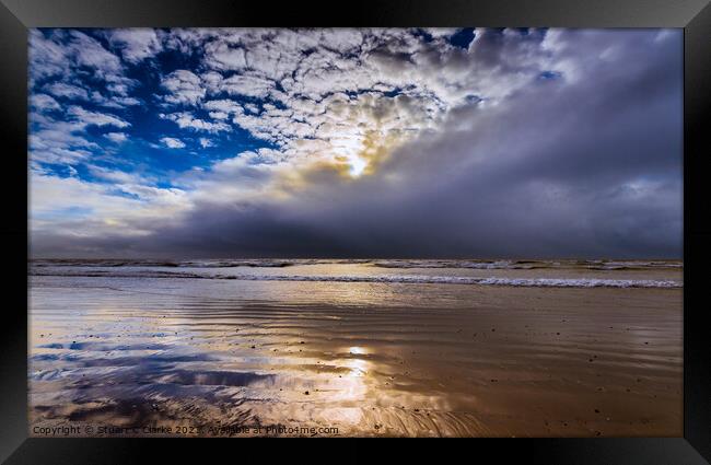 Breaking through the stormclouds Framed Print by Stuart C Clarke