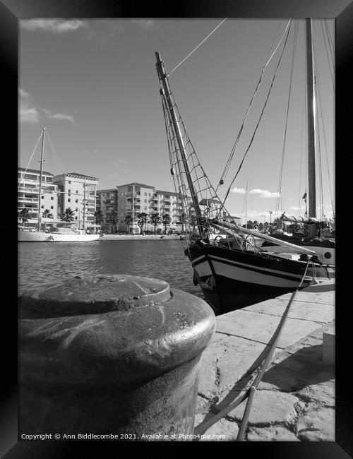 A black and white view of an old sailing boat in t Framed Print by Ann Biddlecombe