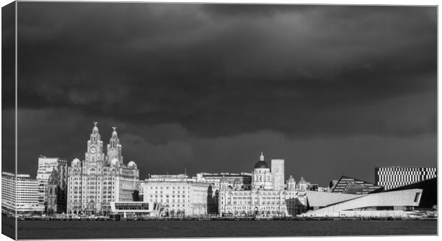 Dramatic sky above the Liverpool skyline in monochrome Canvas Print by Jason Wells