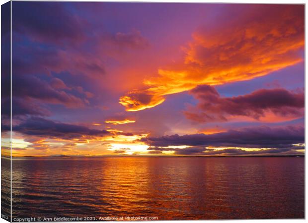 Skys on fire sunset Canvas Print by Ann Biddlecombe