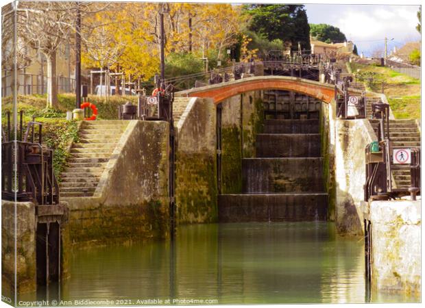 View up the locks on the Canal Du Midi at Beziers Canvas Print by Ann Biddlecombe
