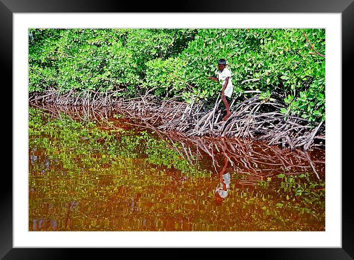 boy at the pond Framed Mounted Print by Hassan Najmy