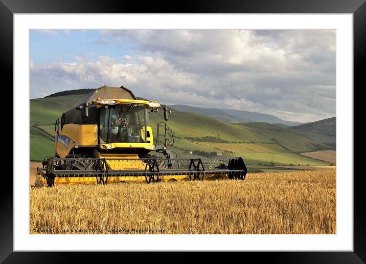 Harvesting barley in the Cheviot Hills. Framed Mounted Print by mick vardy