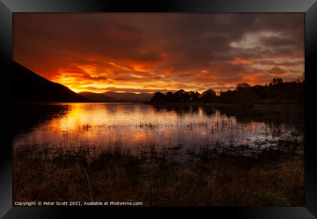 Fire in the sky at Derwent water Framed Print by Peter Scott