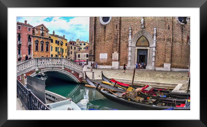 Venice, Italy -Wide angle panorama shot of venzia bridge over canal next to gandola boats against church Framed Mounted Print by Arpan Bhatia