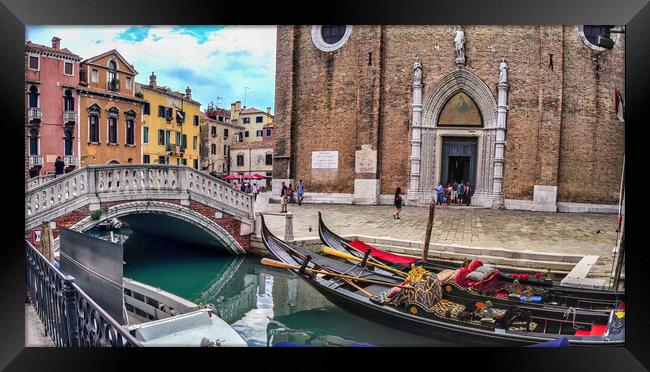 Venice, Italy -Wide angle panorama shot of venzia bridge over canal next to gandola boats against church Framed Print by Arpan Bhatia