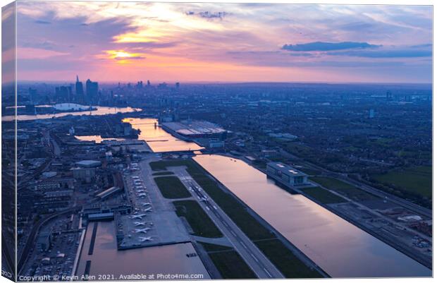 Sunset over City Airport, London. Canvas Print by Kevin Allen