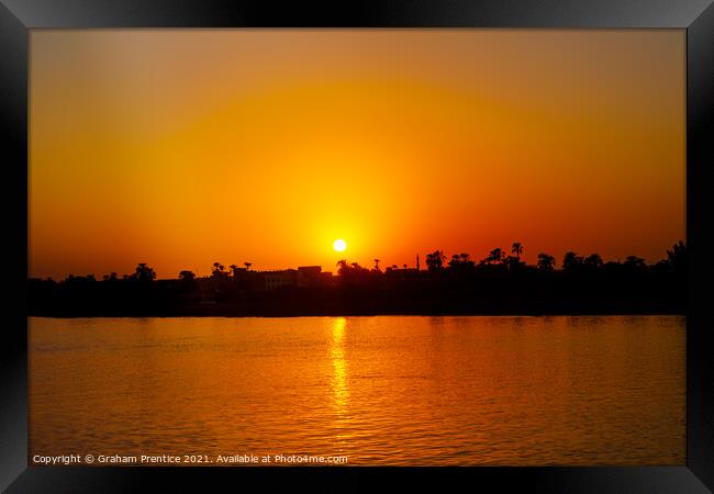 Sunset Over The River Nile Framed Print by Graham Prentice