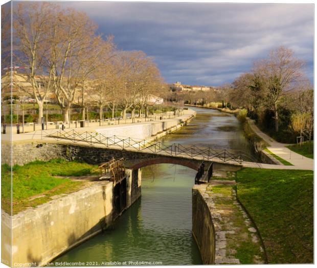 Canal du Midi at Beziers looking down the old sect Canvas Print by Ann Biddlecombe