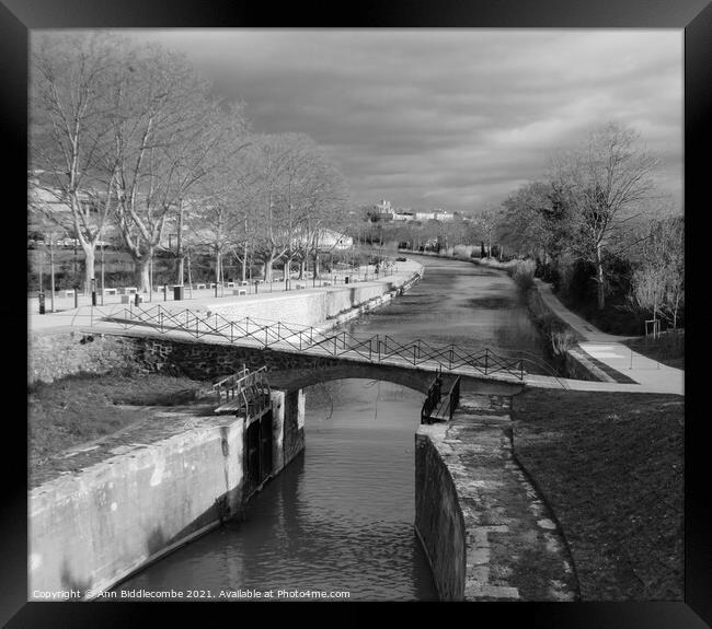 Black and White, Canal du Midi at Beziers looking  Framed Print by Ann Biddlecombe