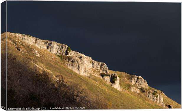 Sunlit crags. Canvas Print by Bill Allsopp