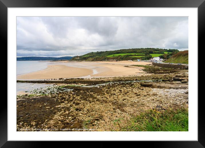 Benllech beach on a cloudy day Framed Mounted Print by Kevin Hellon