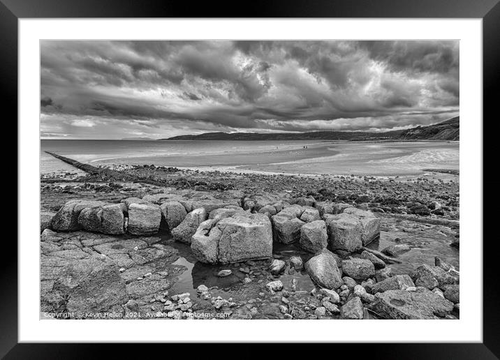 Stormy skies over Benllech Beach Framed Mounted Print by Kevin Hellon
