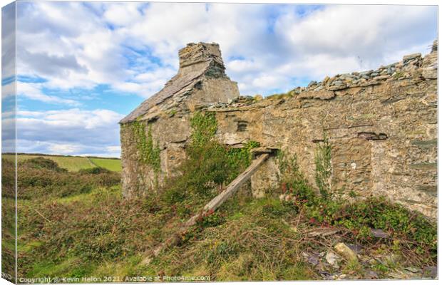 Remains of a stone cottage Canvas Print by Kevin Hellon