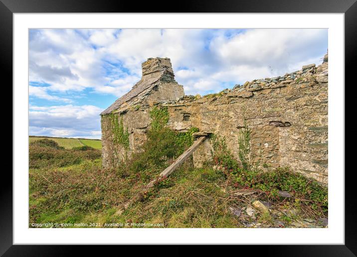Remains of a stone cottage Framed Mounted Print by Kevin Hellon