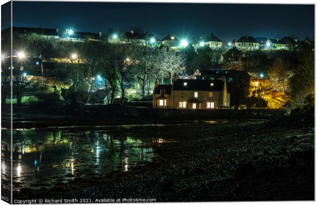 A large house by the river Chracaig estuary where it flows into Loch Portree. Canvas Print by Richard Smith