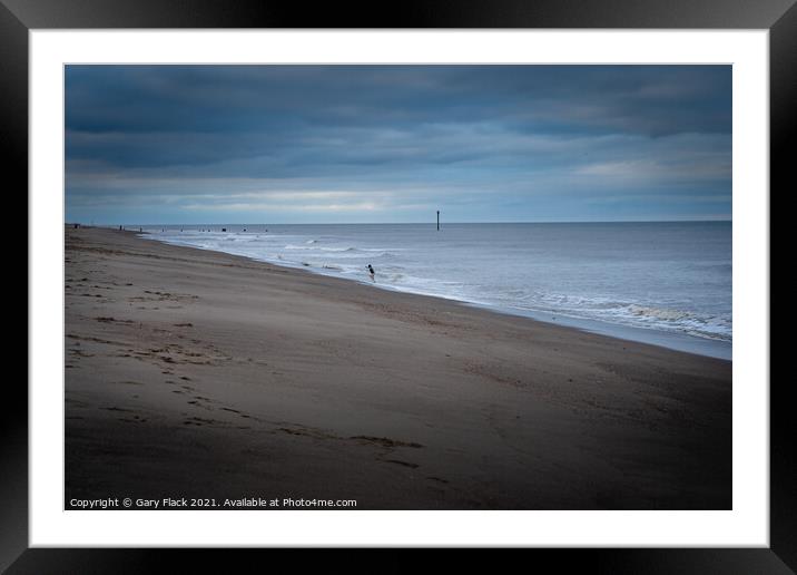 Mablethorpe Beach Solitary child playing Framed Mounted Print by That Foto