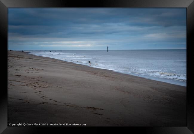 Mablethorpe Beach Solitary child playing Framed Print by That Foto
