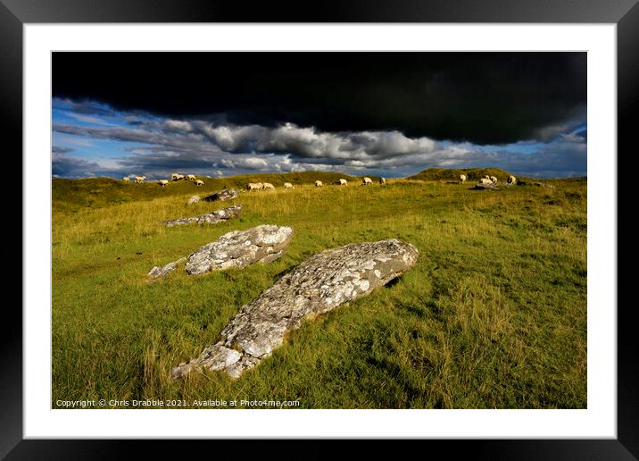 Arbor Low with rain clouds moving throught Framed Mounted Print by Chris Drabble