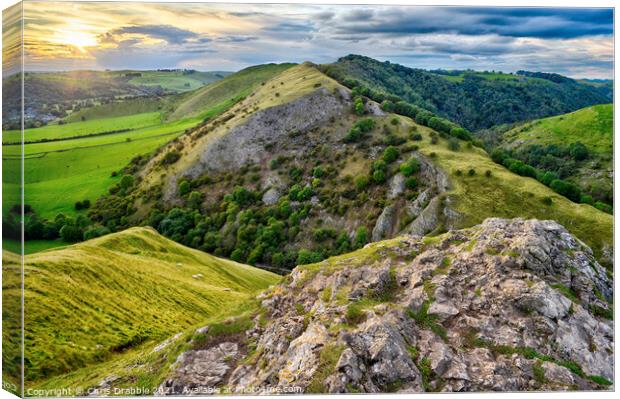 Thorpe Cloud and Bunster Hill at sunset Canvas Print by Chris Drabble