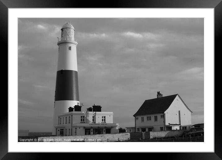 Majestic Lighthouse Glow Framed Mounted Print by Nicola Clark