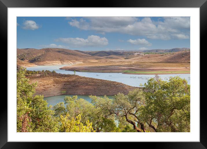 Serene river flowing through picturesque Algarve c Framed Mounted Print by Kevin Snelling