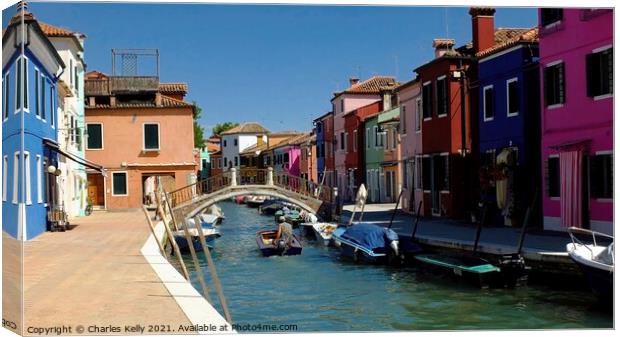 Canal on Burano Canvas Print by Charles Kelly