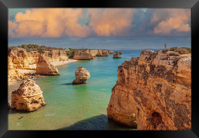 Majestic Cliffs Overlooking Marinha Beach Framed Print by Kevin Snelling