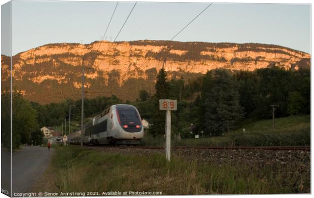 TGV train in the French Alps Canvas Print by Simon Armstrong