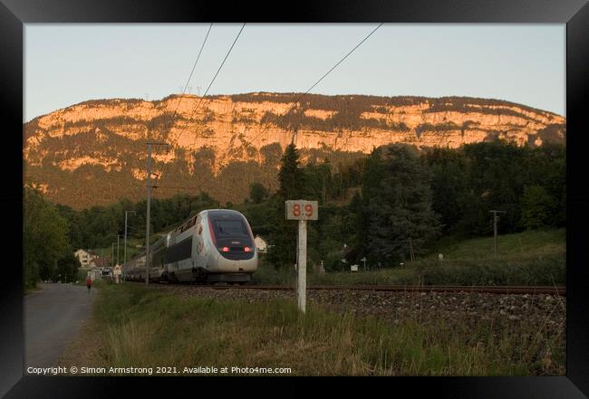 TGV train in the French Alps Framed Print by Simon Armstrong
