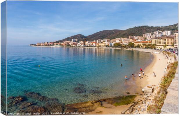 People on Saint Francois beach Canvas Print by Kevin Hellon