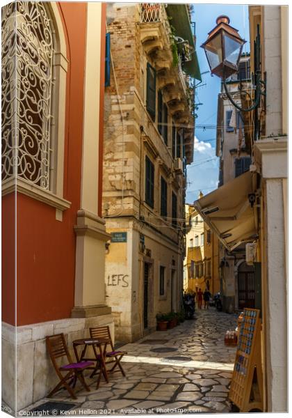 Narrow street in Corfu Town Canvas Print by Kevin Hellon