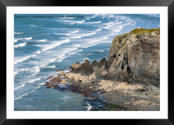 Waves and rocky cliffs at Newport, Pembrokeshire Framed Mounted Print by Andrew Kearton