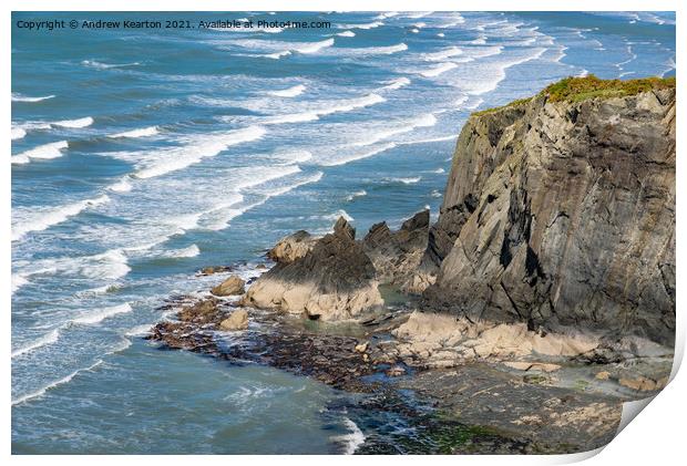 Waves and rocky cliffs at Newport, Pembrokeshire Print by Andrew Kearton