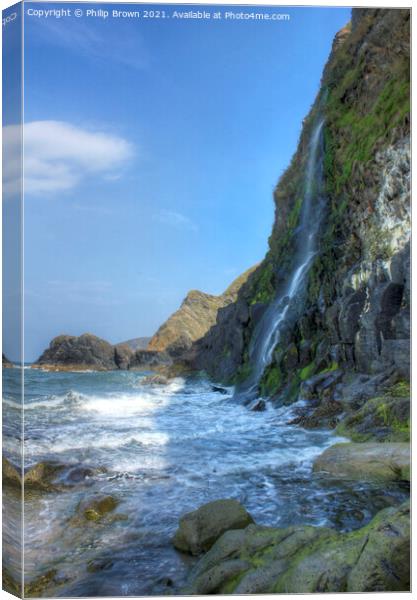 The Waterfall cascades into the sea at Tresaith, S Canvas Print by Philip Brown