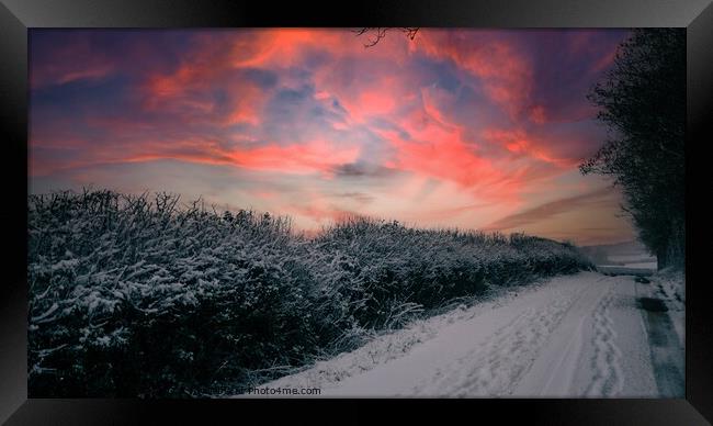 Wintery lane at sunset Framed Print by Paul Tyzack