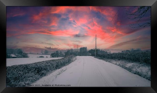 Winter sunset along the lanes Framed Print by Paul Tyzack