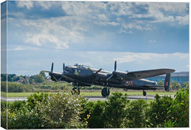 Canadian Lancaster Bomber 'Vera' at Southend Airport in 2014. Canvas Print by Peter Bolton