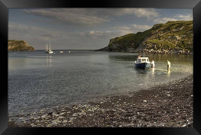 Off to fish at Lulworth Cove Framed Print by Rob Hawkins