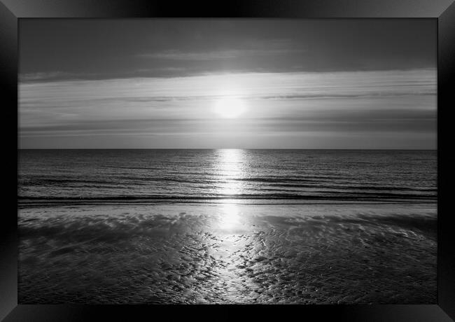 Sunrise over the sea at Frinton in timeless black  Framed Print by Paula Tracy