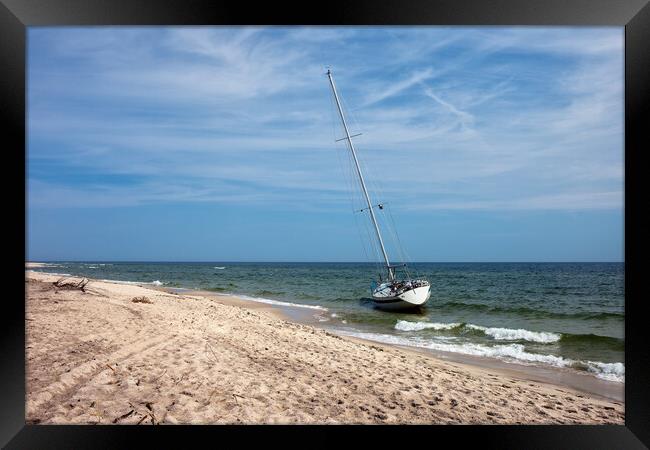 Lonely Sail Boat Moored At Baltic Sea Beach Framed Print by Artur Bogacki