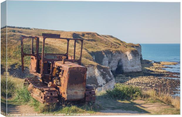 Rusty tractor Canvas Print by Russell Burton